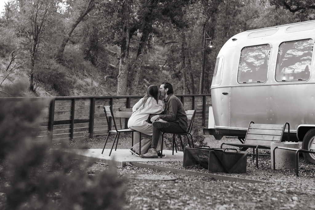couple posing for their engagement photos at a campsite near yosemite | Intimate + Romantic Engagement Photo Ideas at AutoCamp Yosemite