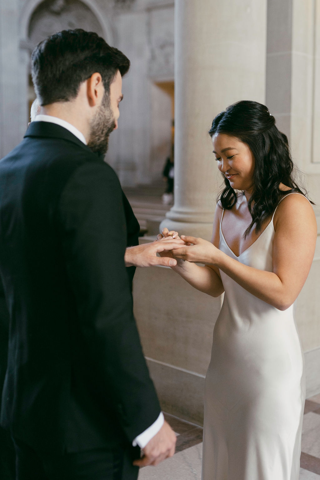couple inside san francisco city hall for their elopement