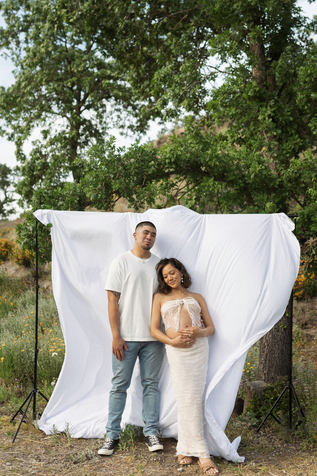 couple posing in walnut creek for their maternity photos