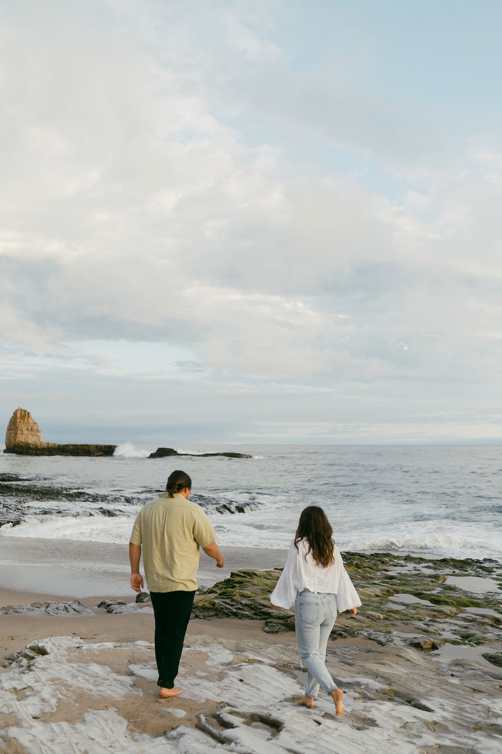 an engagement photoshoot for a newly engaged couple in santa cruz