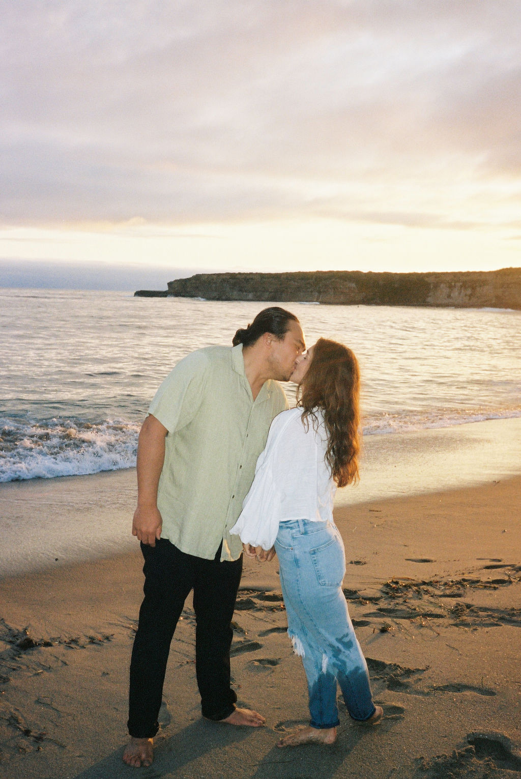 an engagement photoshoot for a newly engaged couple in santa cruz